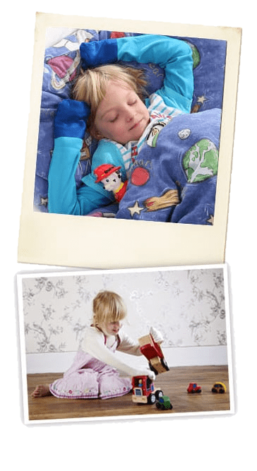 Child sleeping with hands above head wearing kingfisher blue ScratchSleeves (knitted cotton bolero style cardigan with closed hands. The hand section has an outer covering of smooth silk). Second child wearing cream coloured ScratchSleeves playing with wooden car toys, showing the mitts do not interfere with dexterity